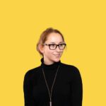 white girl with a turtleneck on a yellow background
